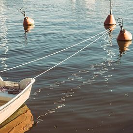 Boat in Dark Water by Patrycja Polechonska