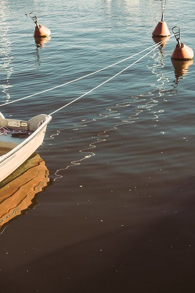 Boat in Dark Water by Patrycja Polechonska