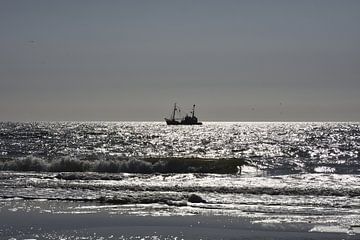 North Sea beach with fishing boat. by Wim Jacobs