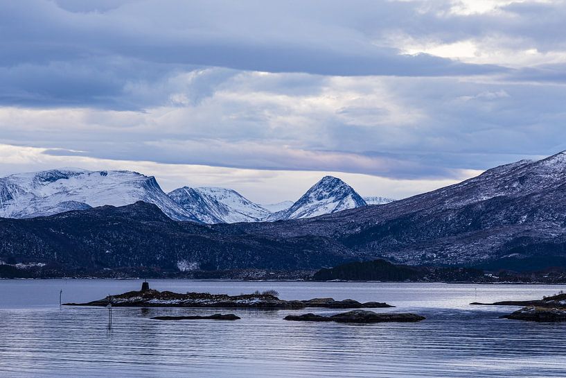 Mountains and rocks in winter near Torvik in Norway by Rico Ködder