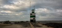 The south pier IJmuiden under chasing clouds.