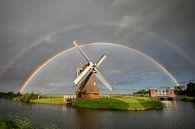big double rainbow over Dutch windmill in summer rain van Olha Rohulya thumbnail
