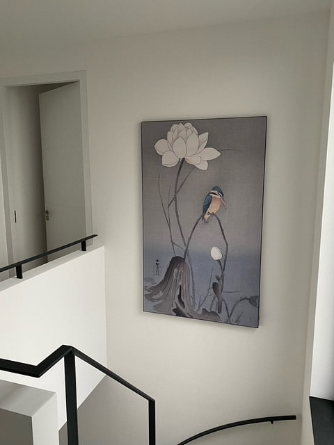 Kingfisher sitting on curved stem near white lotus flower of Ohara Koson