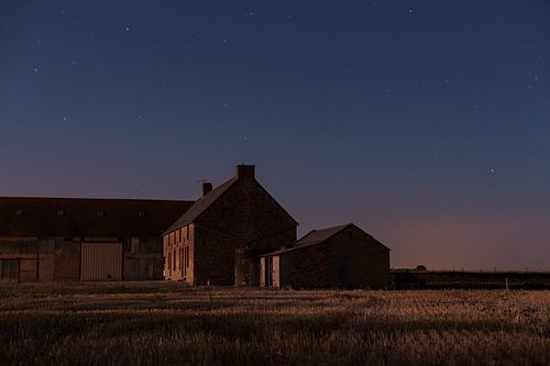 french farmhouse in cornfield at night 1