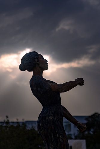 Lady in front of the clouds