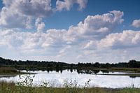 Beautiful clouds sky mirrored in the water.