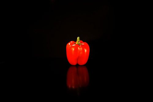 Pepper red with mirror in black table - part 1 of set of 2