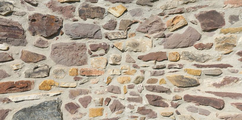 Detail of the historical medieval city wall made of natural stone in Magdeburg by Heiko Kueverling