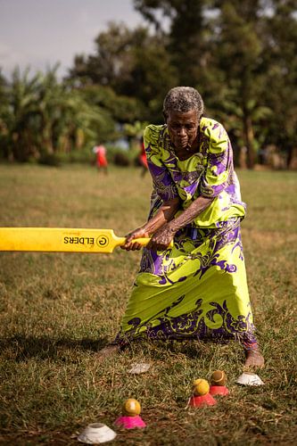 Cricket in Gomesi – De Krachtige Slag in Oeganda
