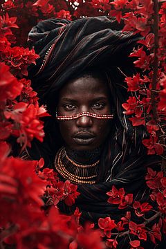 African Tribe Wodaabe portrait among red blossoms by Sander Hupkes