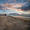 Zonsondergang nederlands strand.  van Arjen Schippers