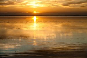 Sonnenuntergang im Wattenmeer von Geertjan Plooijer