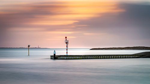 Pier at sunset on Texel by Texel eXperience