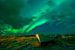 Noorderlicht boven een roeiboot van Tilo Grellmann | Photography