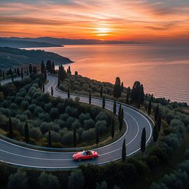 Red Convertible on Winding Road Near Coastline at Sunset by Markus Gann