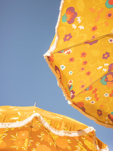 Retro flower power pattern on a 70'’s beach parasol.