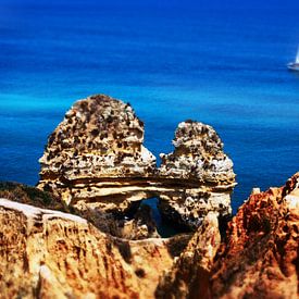 Portugal, Algarve, sailing yacht off the rocky coast by Robert-Jan van Lotringen