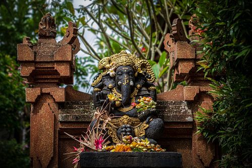 Gold-encrusted stone Ganesha statue in Ubud, Bali, Indonesia. by Jeroen Langeveld, MrLangeveldPhoto