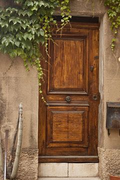 foto van een oude deur in een geweldig Toscaans stadje van Margriet Hulsker
