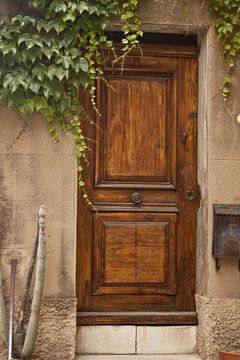 foto van een oude deur in een geweldig Toscaans stadje van Margriet Hulsker