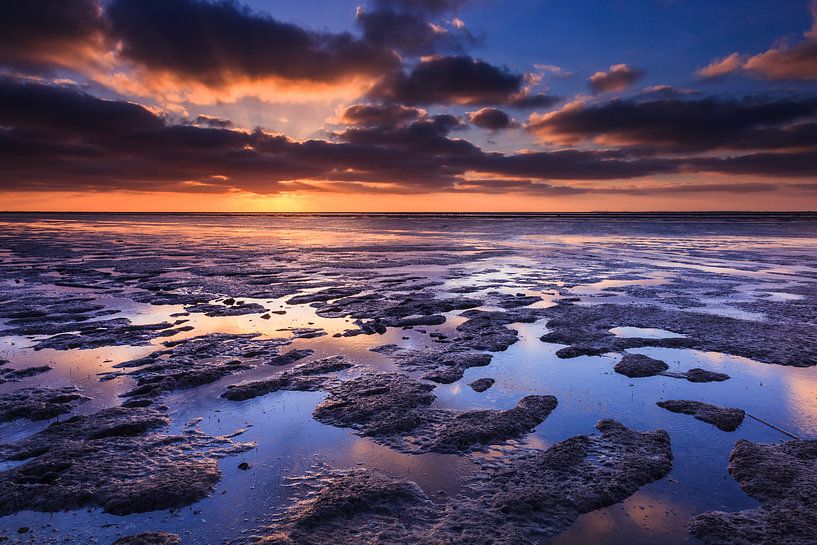 Zonsondergang aan de waddenkust van Karla Leeftink