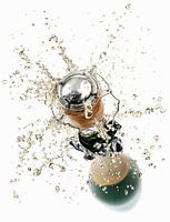 00956481 Cork splashes from a sparkling wine bottle