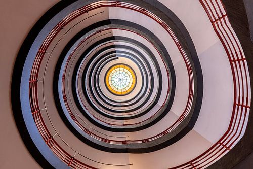 Looking up at a spiral staircase