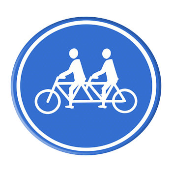 Road sign. Couple on a tandem. Man/Man
