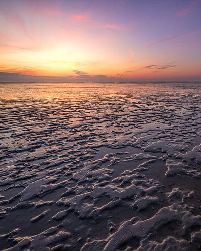 Een Adembenemend Uitzicht op de Waddenzee bij Zonsondergang