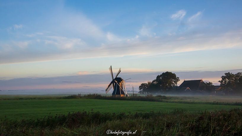 Mill in the rising sun by Hilbrand van der Meulen