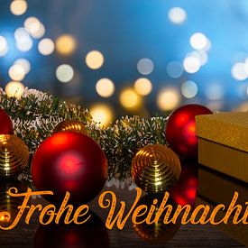 Weihnachtskarte mit Weihnachtsgrüßen und weihnachtlicher Dekor von Udo Herrmann