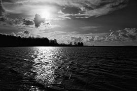 Behind the clouds the sun shines (black and white)