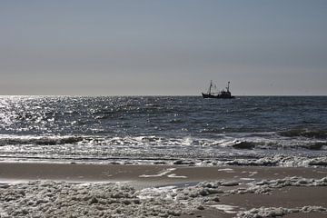 North Sea beach with fishing boat. by Wim Jacobs