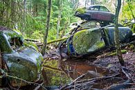 Stacked car wrecks in the forest near Bastnas in Sweden by Evert Jan Luchies thumbnail