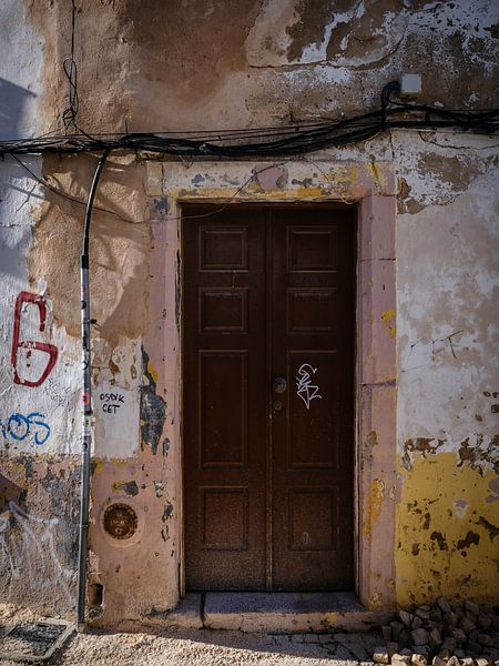 Old dilapidated facade in Lagos by Eddy Westdijk