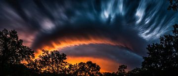 Dramatic sunset with clouds by Poster Art Shop