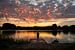 Schitterende zonsondergang bij meer in Vuren van Chris Heijmans