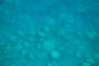 Turquoise Serenity: The Magic of Stones Underwater