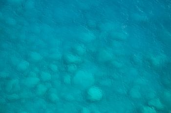 Turquoise Serenity: The Magic of Stones Underwater