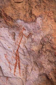Rock drawing in cave of ancient civilization by Bobsphotography