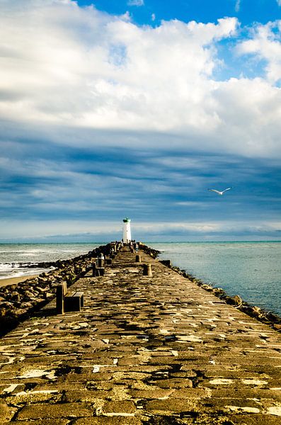 Pier and lighthouse in Grau d'Agde in the south of France by Dieter Walther