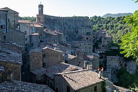 City against mountain by Mike Frinking