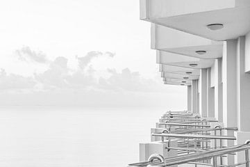 Row of balconies in coastal hotel Vietnam. by Ron van der Stappen