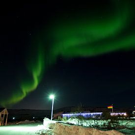 Noorderlicht of poollicht tijdens de wintermaanden in Ijsland van Guido Boogert