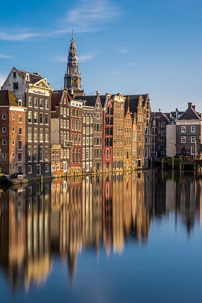 Canal houses on the Damrak, in Amsterdam by Thea.Photo