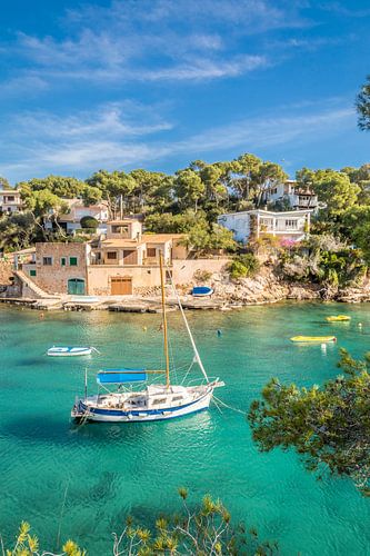 Sailing boat in the bay at Cala Figuera, Mallorca by Christian Müringer