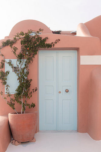Blue door in orange building | travel photography print | Oia Santorini Greece