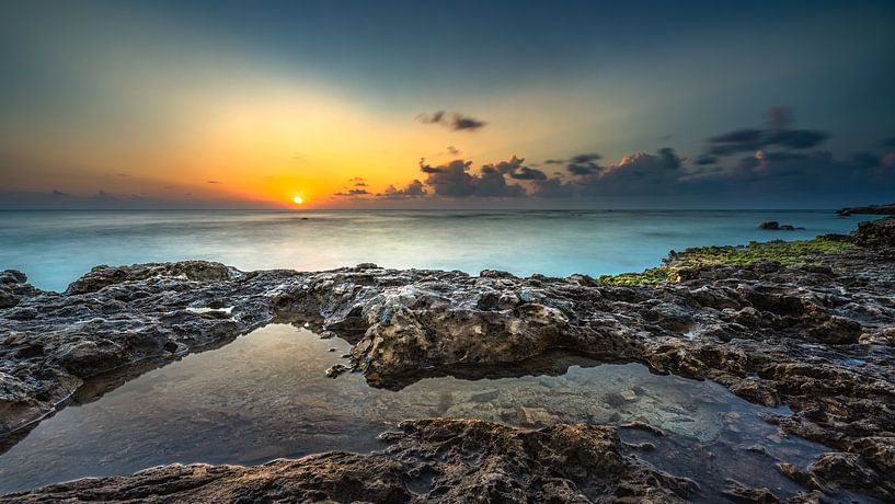 Sunset at the western tip of Aruba by Harold van den Hurk