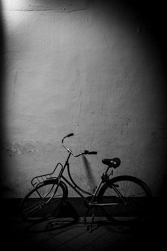 Lonely bike under a lamp