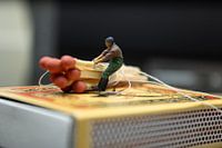 Miniature figures in our big people's world